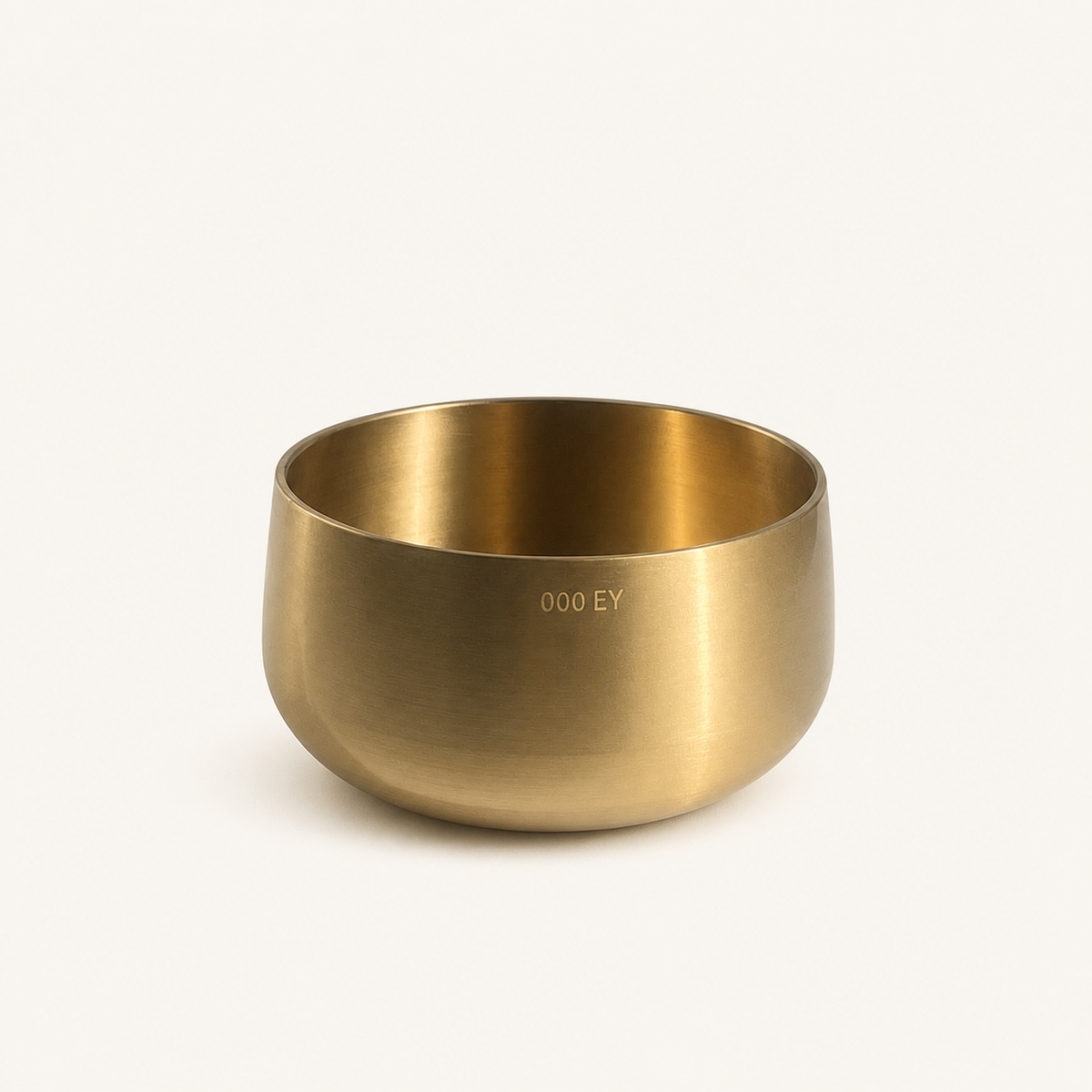 Brass singing bowl engraved with its edition number and owner's initials
