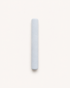 Aritual mallet, a suede-wrapped cylinder in pale blue-grey